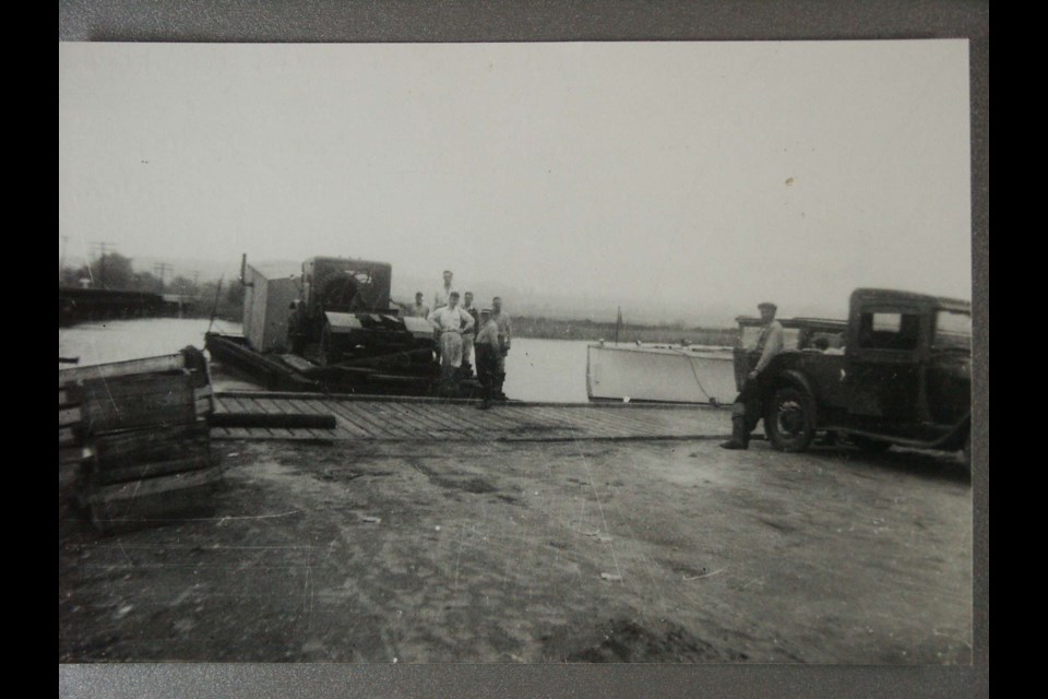 After an Avro Anson made an emergency landing in the Holland Marsh, an army truck was loaded aboard Ben Collings’s scow to retrieve the aircraft.
