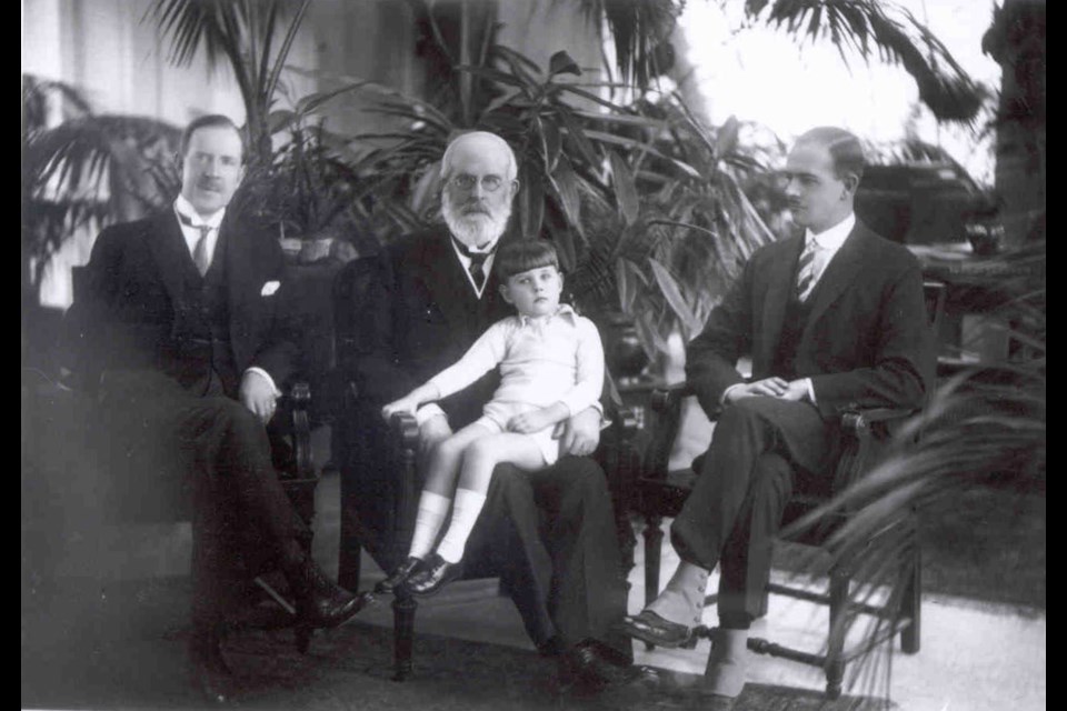 Sir William Mulock was a towering figure in Canadian politics. Here, an elderly Mulock sits with his son, grandson, and great-grandson.