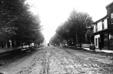 Bradford's Holland Street at the turn of the century - muddy and treelined. BWG Public Library archives