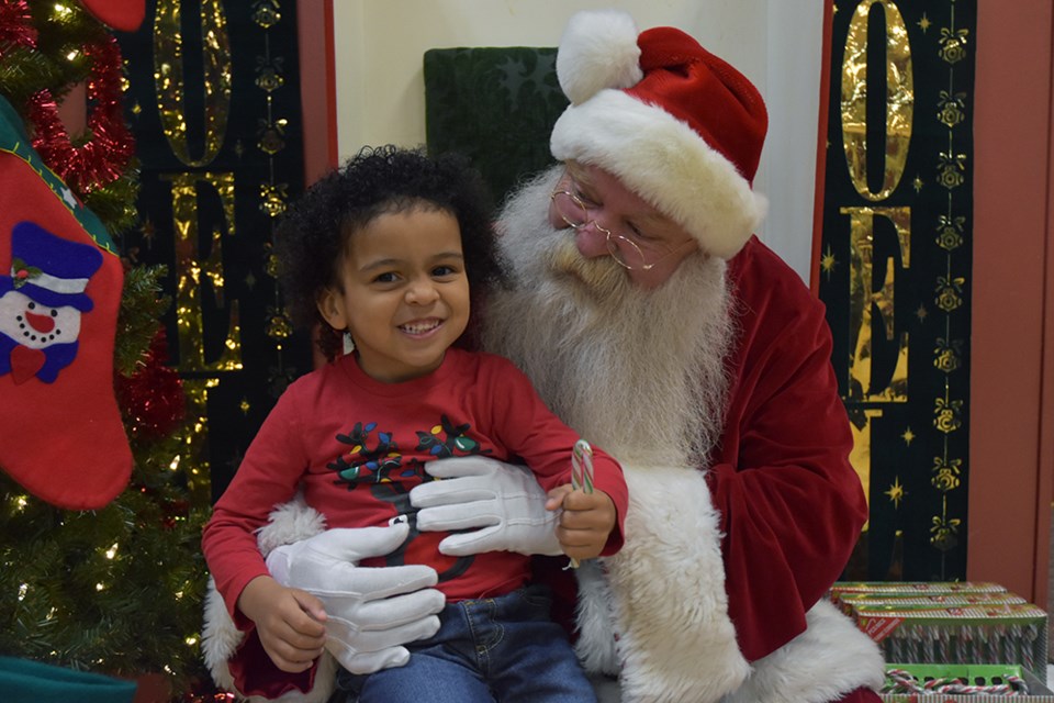 Joziah, three, meets Santa Claus. Miriam King/BradfordToday