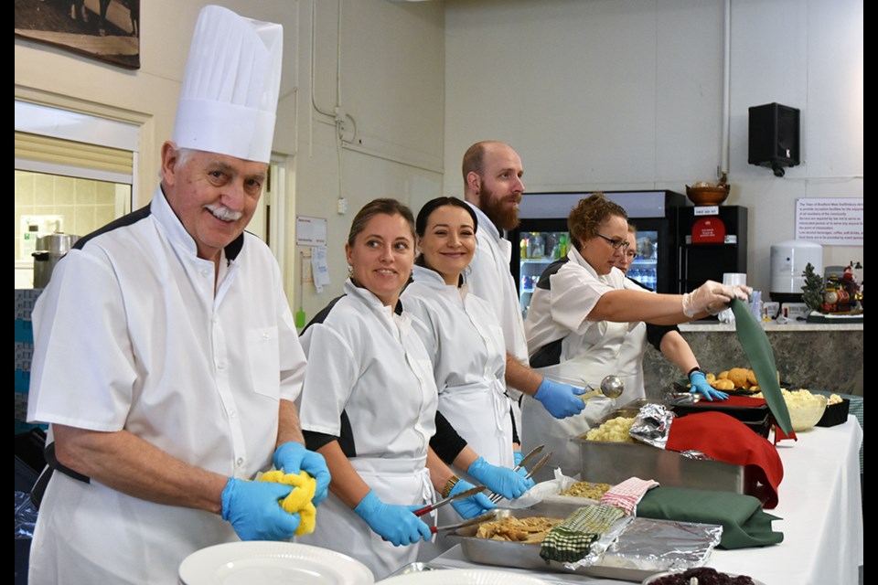Chef Colin Bird and Staff, of Catering by Colin, cooked and served Christmas Dinner at the Danube Seniors Leisure Centre on Dec. 8. Miriam King/Bradford Today