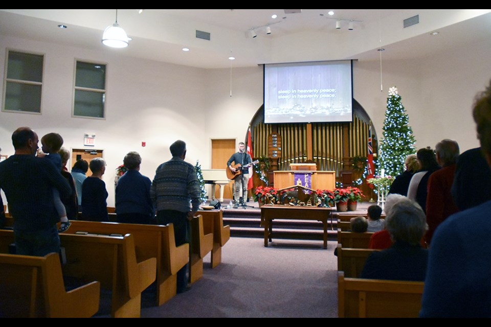 The scene at a carol sing at St. John's Presbyterian Church in Bradford, Dec. 9. Miriam King/Bradford Today