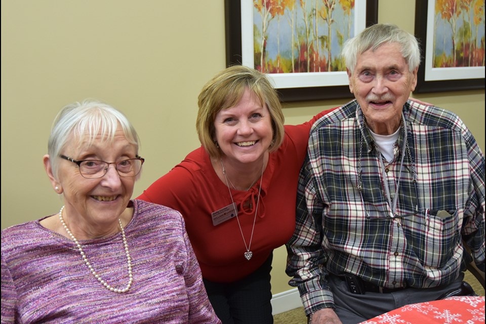 Sales and Marketing Manager for Holland Gardens Shelley Snoulten, centre, with Rutger and Jane Fick, the first to register for a suite in the new retirement residence. Miriam King/Bradford Today