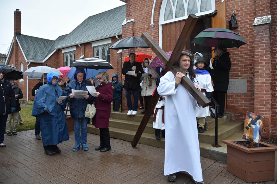 Prayers at Trinity Anglican Church on Good Friday, as the Stations of the Cross are portrayed. Miriam King/Bradford Today