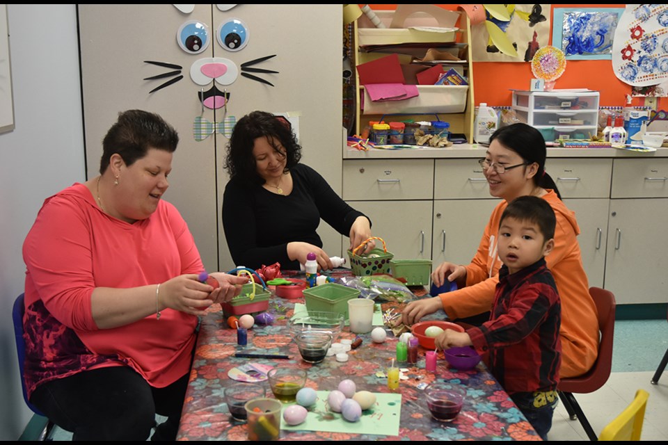 Parents, caregivers and preschoolers make Easter crafts Saturday morning at the EarlyON Centre in Bradford. Miriam King/Bradford Today