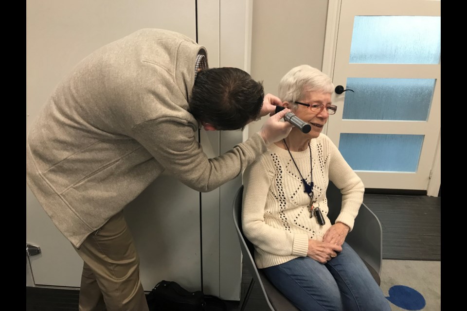 Toni Vandenbroucke getting fitted for her new top of the line hearing aids at Bradford HearingLife on Wednesday, March 22, 2023.