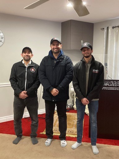 From left, AMYA volunteers Kashif Ahmad Meer, Zeeshan Iqbal and Ezaaz Saeed.