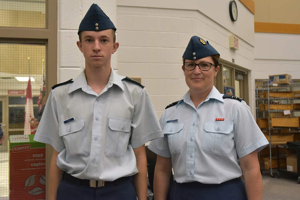 Rosanne Case helps equip Sgt. Haag – a Bradford resident who had to travel to Pefferlaw to join the Air Cadets, but who is now back in Bradford, with 37 Flight. Miriam King/BradfordToday