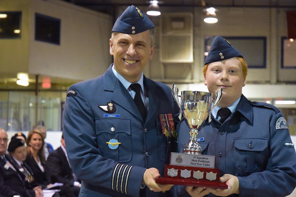 Reviewing Officer Col. Godbout presents the award for Best First-Year Cadet to LAC Noah Sellers. Miriam King/Bradford Today