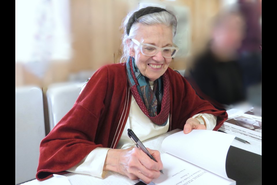 June Chambers, of Bond Head, sold and signed copies of her book, Material Pleasures: Reflections of a Textile Collector, at an event at the Tec-We-Gwill Hall in Newton Robinson on April 27.