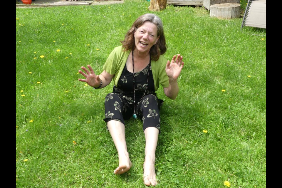 Cathy Nesbitt teaches laughter yoga in her backyard every Sunday throughout the summer. Jenni Dunning/BradfordToday