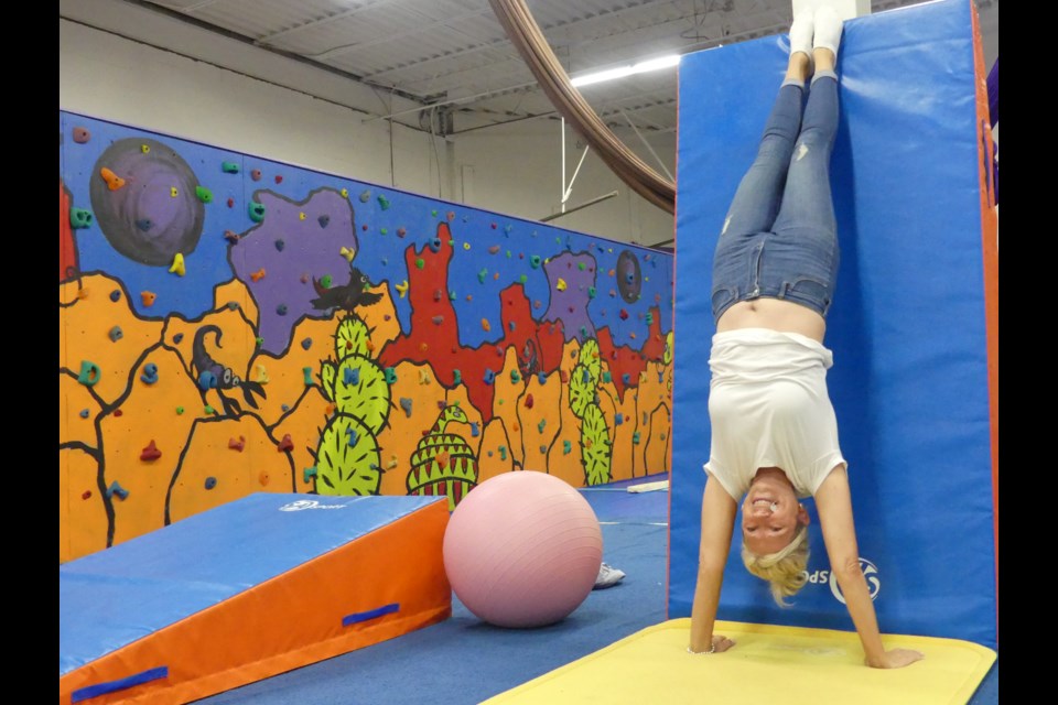 She has still got it! Genesis Gymnastics owner Donna Katz does a handstand. Jenni Dunning/BradfordToday