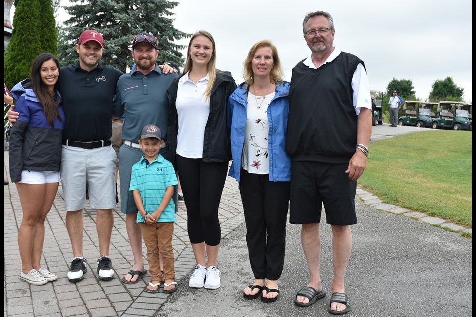The Bagg family – Bill, Sandra, Samantha, Kyle, five-year-old Tyler, Sean and Lynn, at Bradford Highlands Golf Club on June 23 for the Break The Silence Randy Bagg Memorial Golf Day. Miriam King/Bradford Today
