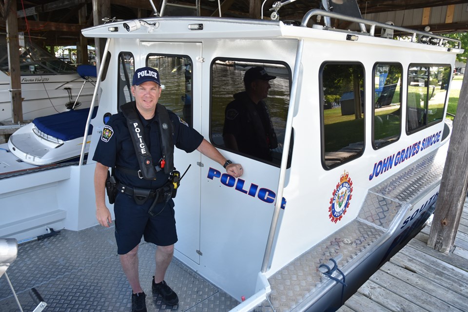 Sgt. Dave Phillips of the South Simcoe Police marine unit on board the John Graves Simcoe at Lefroy Harbour marina. Miriam King/Bradford Today