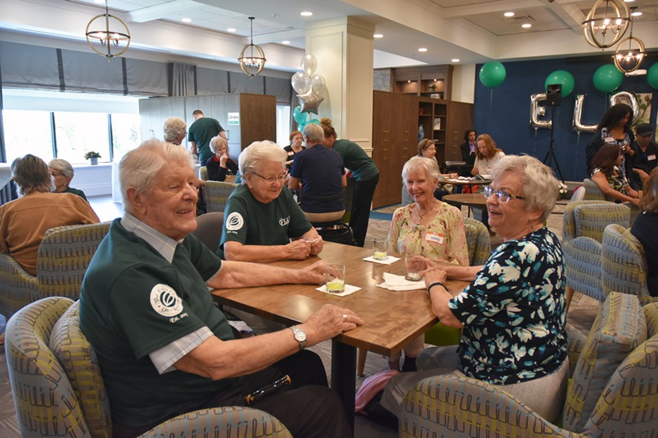 Residents and staff donned green t-shirts for The Elden's Grand Opening on Saturday. Miriam King/Bradford Today