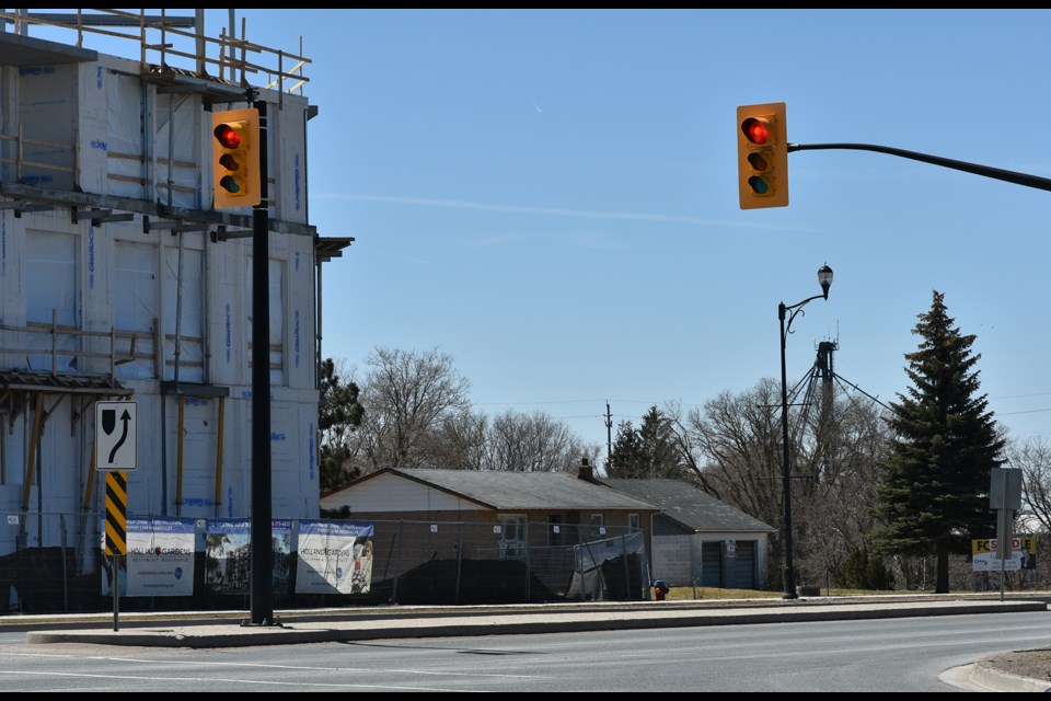 At left is Holland Gardens, a retirement home currently under construction. To the right of the construction is the land proposed as the site of another retirement residence that would offer 130 independent living suites. Miriam King/Bradford Today