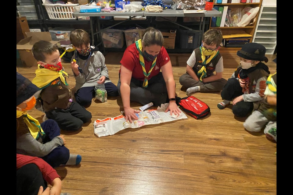 Bradford Beavers making First Aid Kits 