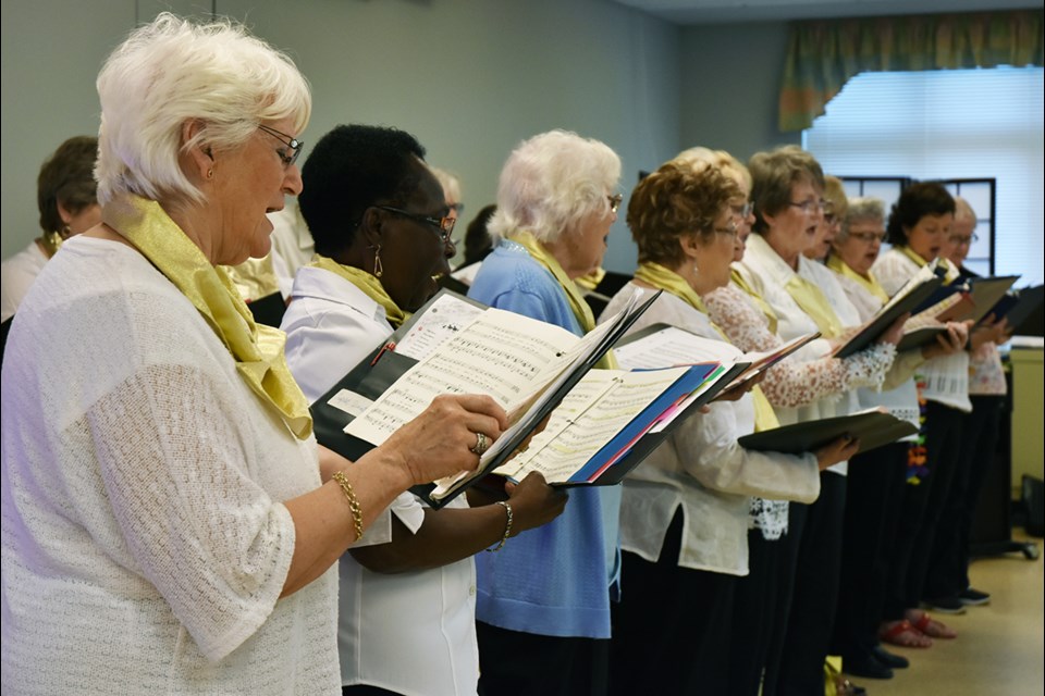 The Goldenaires Choir from the Danube Seniors Leisure Centre – all wearing gold scarves – perform at Bradford Valley Care Community on May 22. Miriam King/Bradford Today