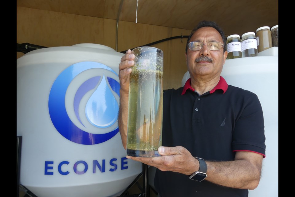 Andrew Amiri of Econse Water Purification System shows off some of his research in the Holland Marsh. Econse was eliminated from the competition Oct. 24. Jenni Dunning/BradfordToday