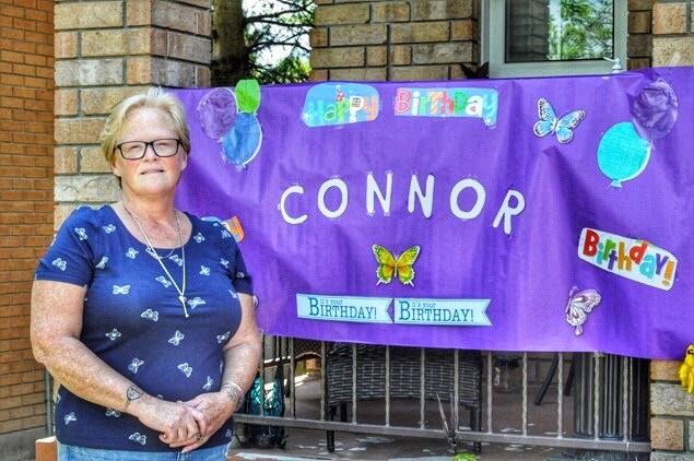 Wendy Ramsay (Mother of Connor Ramsay) honours his ‘would-be’ 20th birthday with a banner.  Jackie Kozak for BradfordToday