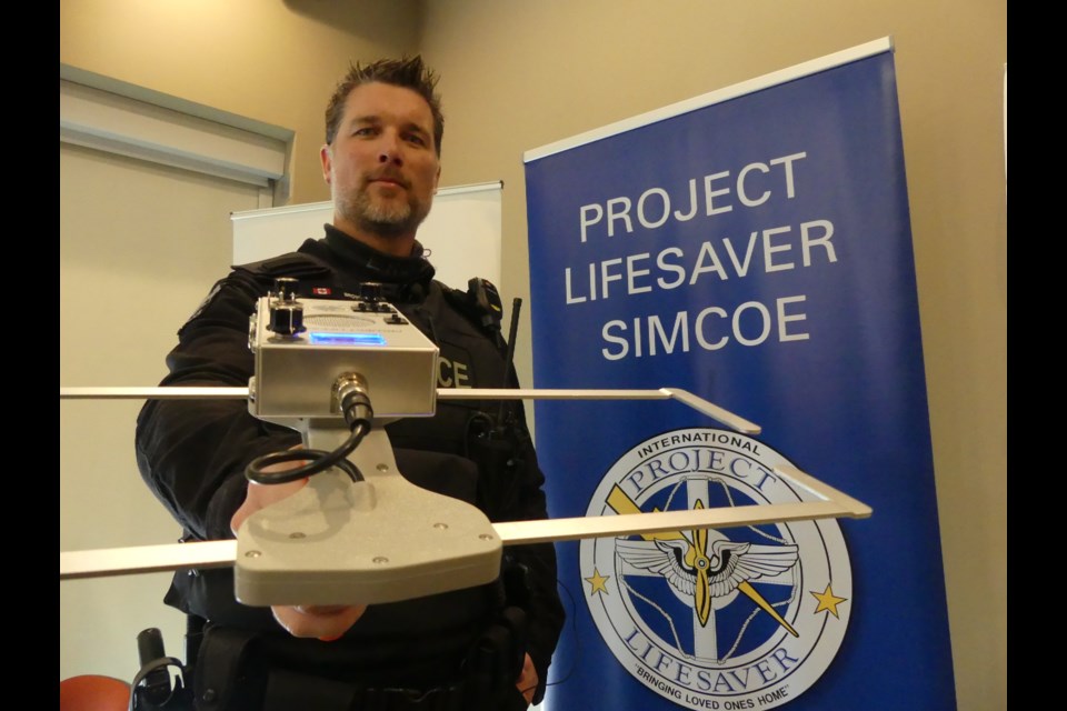 South Simcoe Police Const. Wes Brown with one of the Project Lifesaver Simcoe receivers. Jenni Dunning/BradfordToday