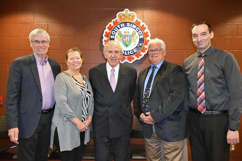 New BWG-Innisfil Police Services Board: from left, BWG Mayor Rob Keffer, Innisfil Mayor Lynn Dollin, new provincial appointee Doug Bernardi, Chair Rod Hicks, Vice Chair Licinio Miguelo, at South Division in Bradford. Miriam King/Bradford Today