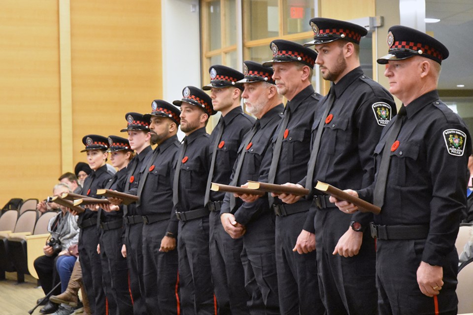 Ten graduates of the Auxiliary Officer training program, ready to take their Oath of Office at the Innisfil Town Hall on Tues. Miriam King/Bradford Today