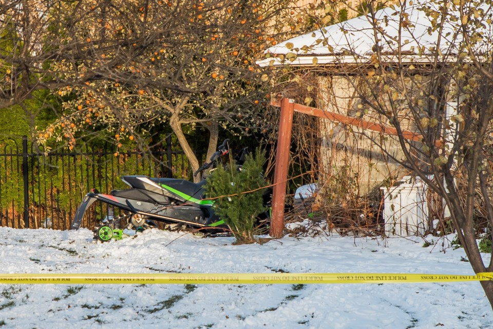 Police investigate a snowmobile crash on Sunday afternoon. Paul Novosad for BradfordToday
