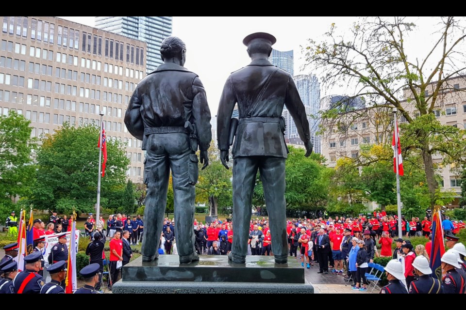 Participants in the National Peace Officers’ Memorial Run are shown at Ontario Police Memorial Park in 2019.