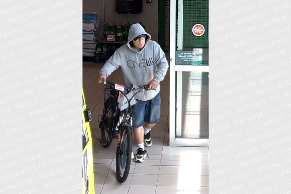 Police are looking for a suspect in the theft of an electric bike from Canadain Tire in Alliston on Aug. 13.