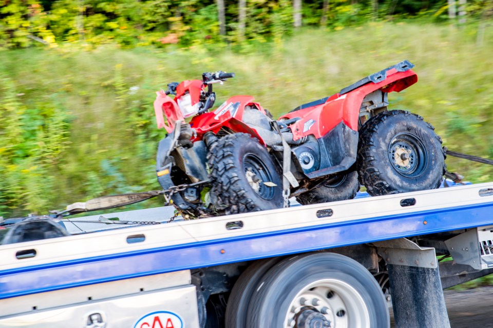 A heavily damaged ATV is removed from the scene of a fatal collision early this morning. Paul Novosad for BradfordToday