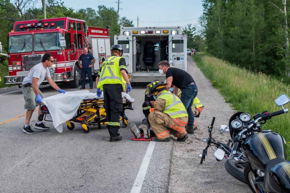 First Responders prepare the patient for transport to Southlake Hospital. Paul Novosad for BradfordToday.
