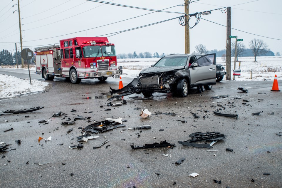 Debris scattered through the intersection of Line 6 and 10 Sideroad, Saturday. Paul Novosad for BradfordToday