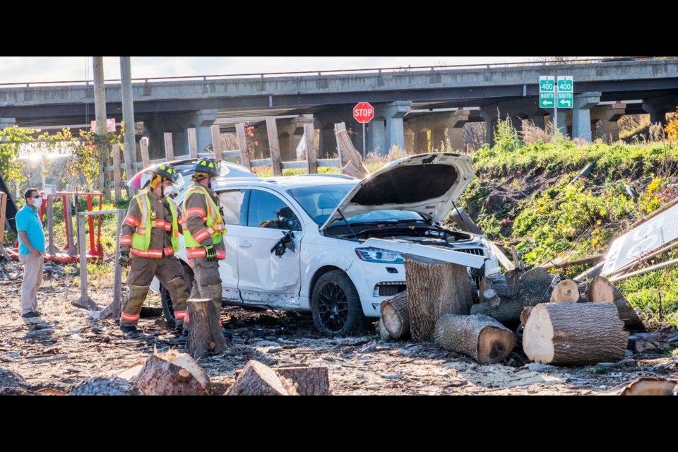 Emergency services attended the single-vehicle rollover off Canal Road at Highway 400 this afternoon, Oct. 13. Paul Novosad for BradfordToday.