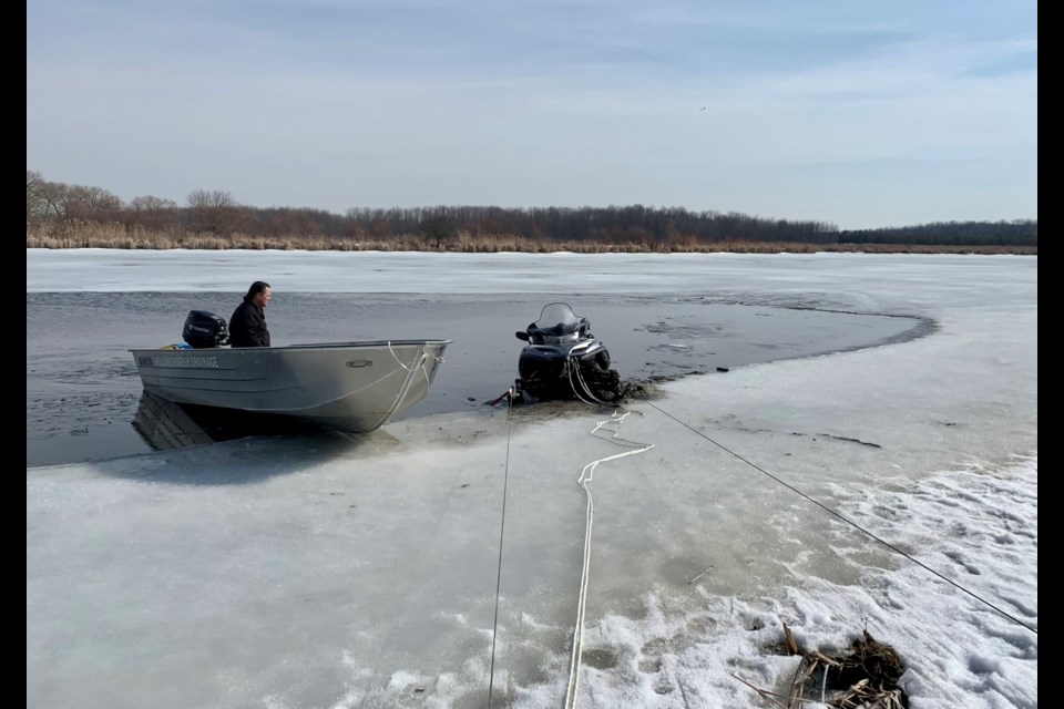 Police recently responded to a snowmobile that had gone through the ice on the Holland River.