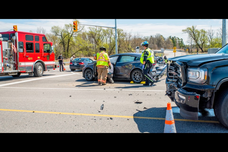 Police, fire, and paramedics responded to a three-vehicle crash on Saturday afternoon.