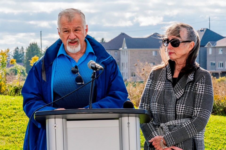 The parents of Constable Devon Northrup, Ron and Heather Northrup, speak at the dedication ceremony in which the former Middletown Park was renamed to the Constable Devon Northrup Memorial Park.