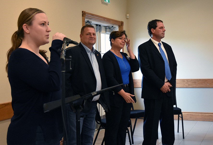 Election official Kailey Vokes announces the winner of the nomination for candidate, as nominees Jason Verkaik, Heather Fullerton and Scot Davidson stand by.  Miriam King/BradfordToday