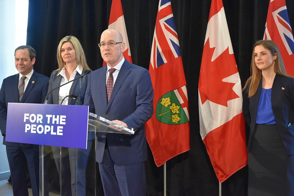 Minister Steve Clark announces new funding, surrounded by MPPs (from left) Doug Downey, Jill Dunlop and Andrea Khanjin. Miriam King/Bradford Today