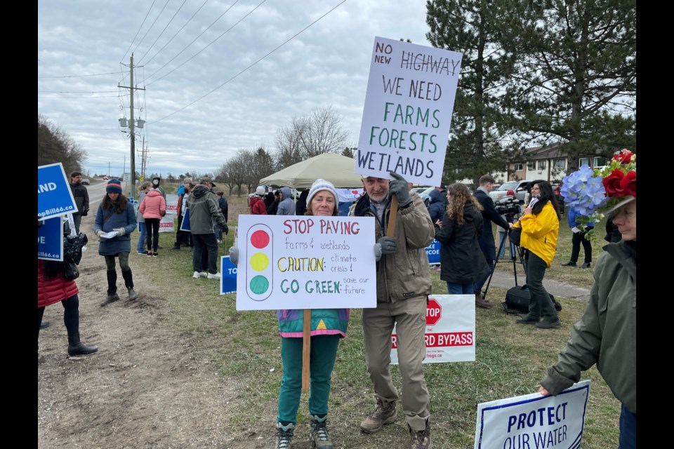 Demonstrators gathered in front of Minister of Transportation Caroline Mulroney's office in Holland Landing to protest the Bradford Bypass and Highway 413.