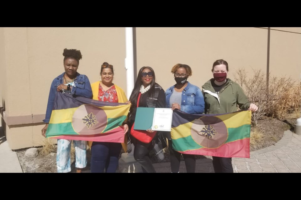 (Left-Right) Rise Up BWG Members: Nadia Sinclair, Julie Kumar, Cheraldean Duhaney, Michelle Melo, and Jennifer Lloyd - representing at the Anti-Racism Flag Raising in Bradford. 