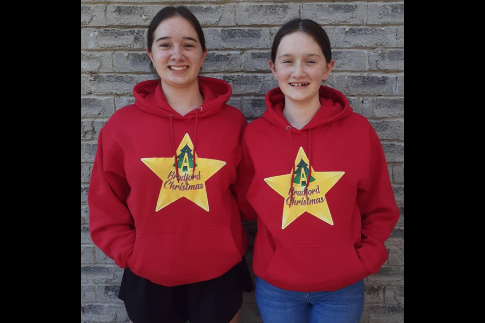 Sarah (left) with her sister Emily Dahlgren: creators of the non-profit group "A Bradford Christmas" which strives to raise $50,000 for the hamper project with a Helping Hand Food Bank this year. 
