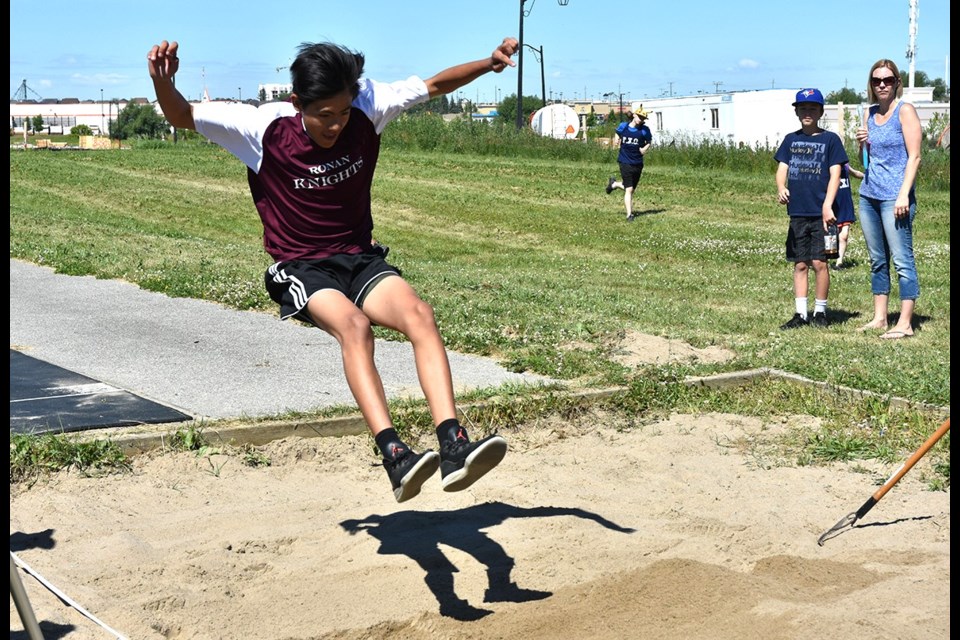 A student participates in the triple jump event. Miriam King/Bradford Today