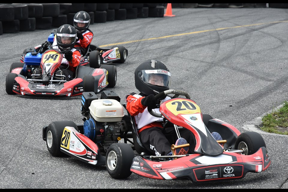 Kids take a spin in some go-karts while learning about driving safety at Sunset International Speedway on Aug. 6 as part of kartSTART. Miriam King/BradfordToday