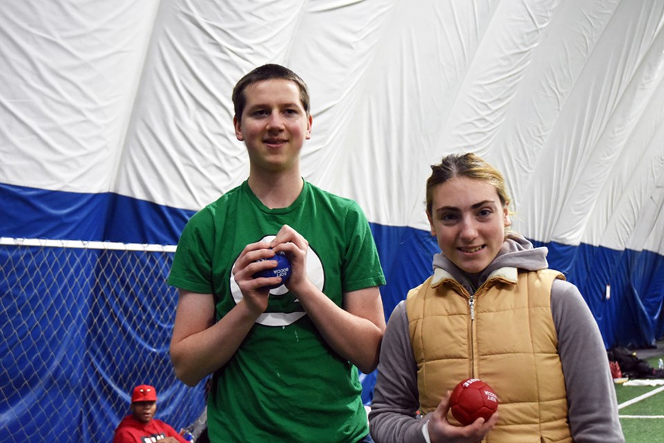 Representing Barrie North Collegiate, Special Olympics athletes Emily Craig and Chris Quinn practice bocce at the Bradford Sports Dome. Miriam King/Bradford Today
