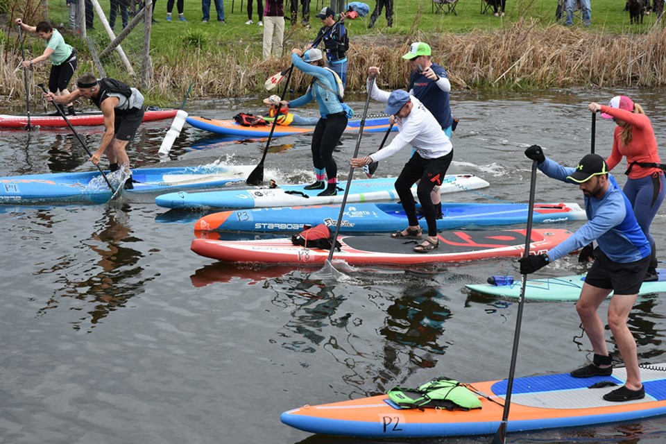 Stand-up paddleboarders had their own class at the 41st annual Marsh Mash marathon races in Bradford Saturday. Miriam King/Bradford Today
