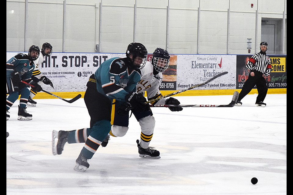 Orillia and Bradford chasing the puck, in Game 4 of the OMHA Midget A Semi-final. Miriam King/Bradford Today