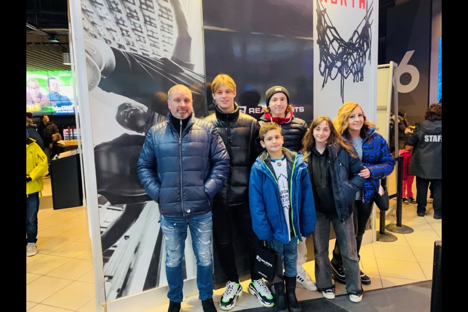 The Barkan family is shown with Bradford Rattlers goaltender Oliver Balazs and forward Stepan Levitskiy at a Toronto Marlies game.