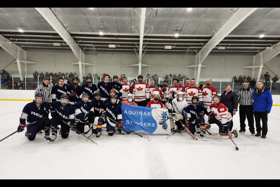 Players from the St. Thomas Aquinas Catholic Secondary School Stingers and the Nottawasaga OPP Civics are shown.