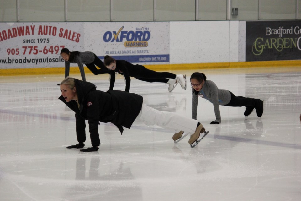 Olympian skater Shae-Lynn Bourne has members of the Bradford & District Skating Club working out on the ice. Supplied photo/Bradford & District Skating Club